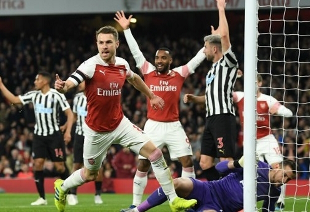 Arsenal 2 -0 Newcastle United: Aaron Ramsey and Alexandre Lacazette send Gunners third