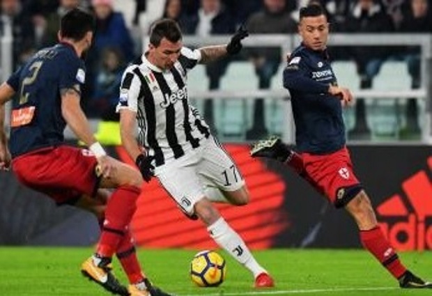 Juventus 1 -0 Genoa: Douglas Costa saves below par hosts as they close the gap on Serie A leaders Napoli 