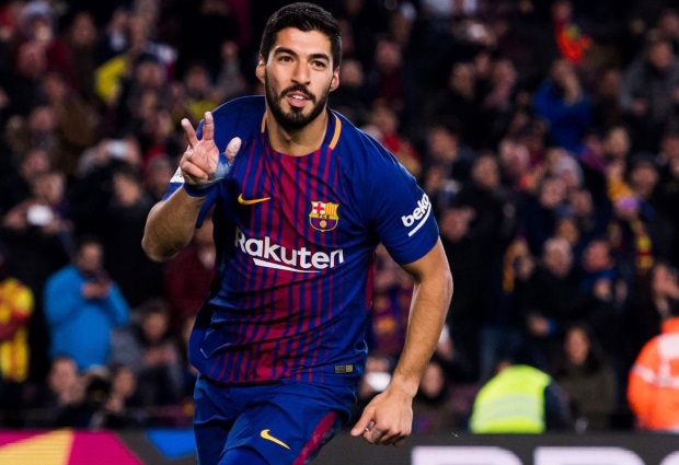 Barcelona 1 -0 Valencia: Luis Suarez heads in only goal after Lionel Messi magic in Copa del Rey clash