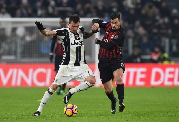 AC Milan 0 -2 Juventus: Higuain-inspired champions go joint-top as Montella's men suffer again